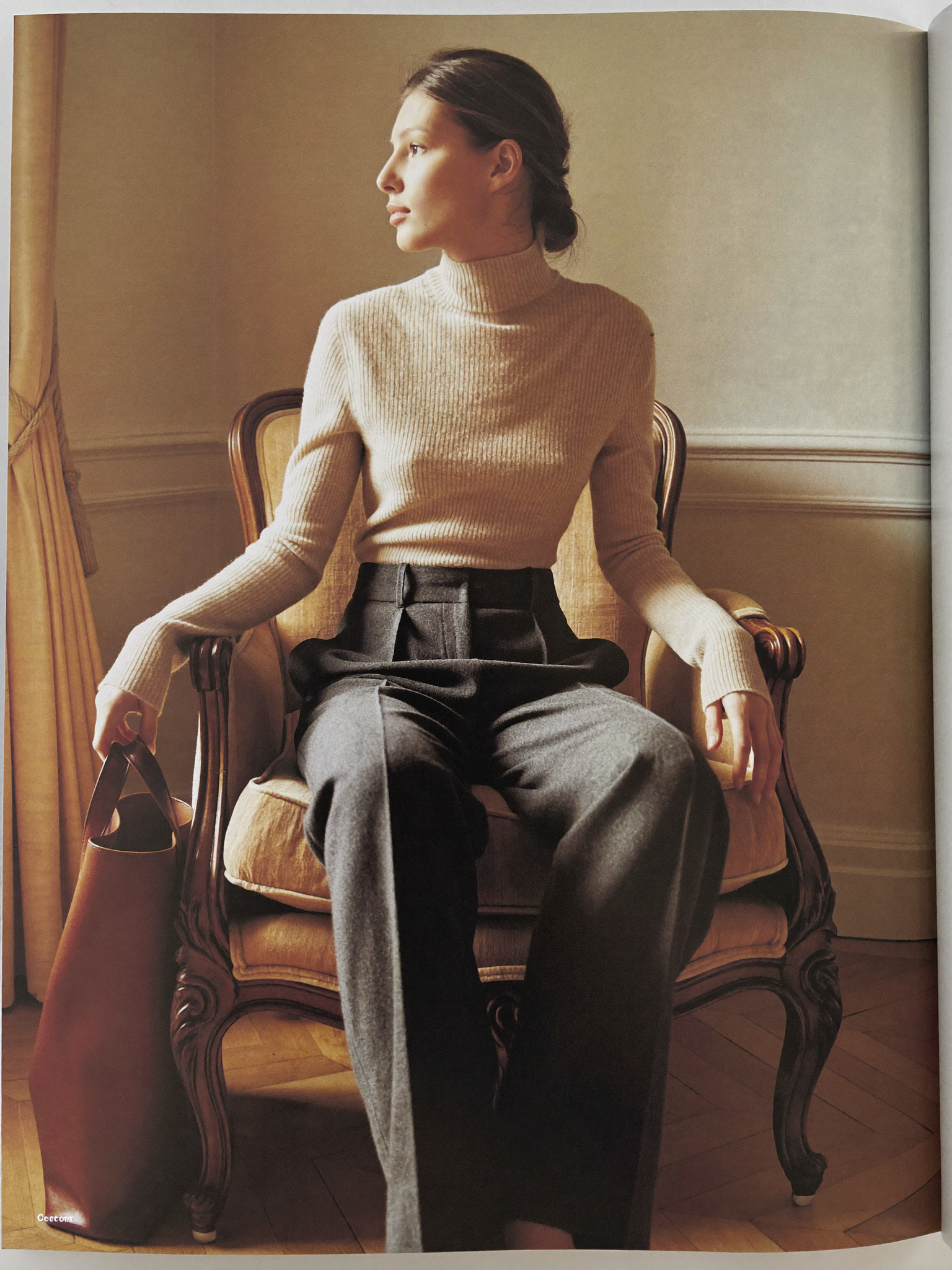 The cashmere knit, photographed in a palazzo room